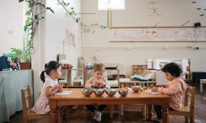 AMI Montessori 0–3 diploma training – toddlers setting the table and preparing their meal in a prepared environment